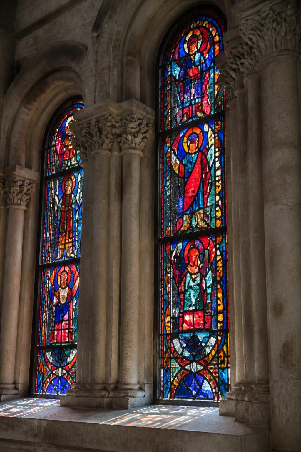 Beautiful Stained Glass Windows: 14 Sites That Changed Light Forever 8 Romanesque stained glass windows depicting biblical figures in Augsburg Cathedral.