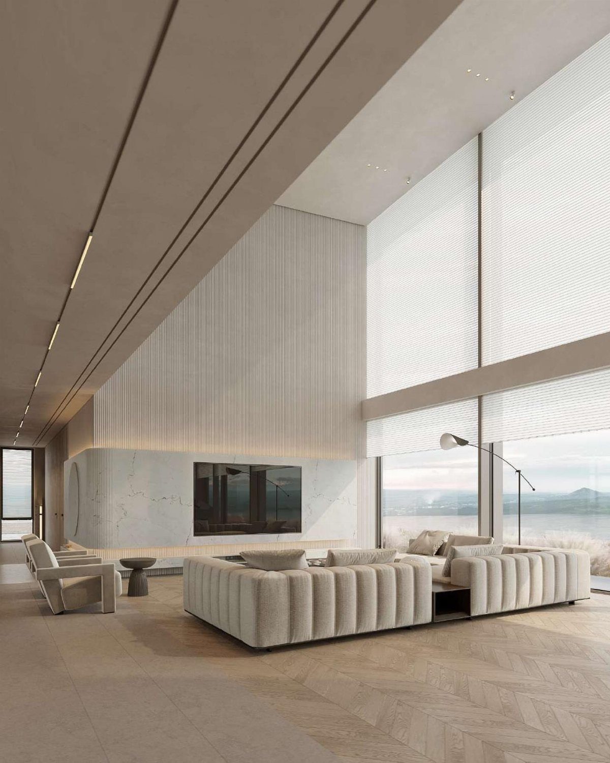 Modern living room featuring massive floor-to-ceiling panoramic windows overlooking a distant landscape.