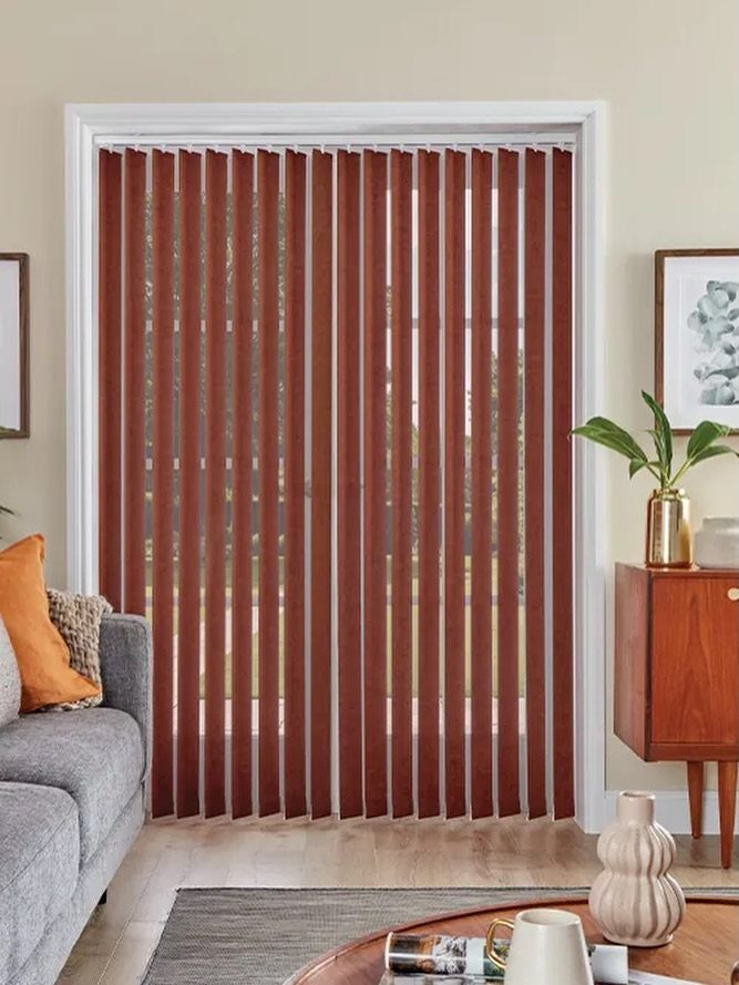 Window Blinds for Living Room: 11 Photo Ideas 3 Red vertical blinds hanging over a large glass door in a modern living room setting.